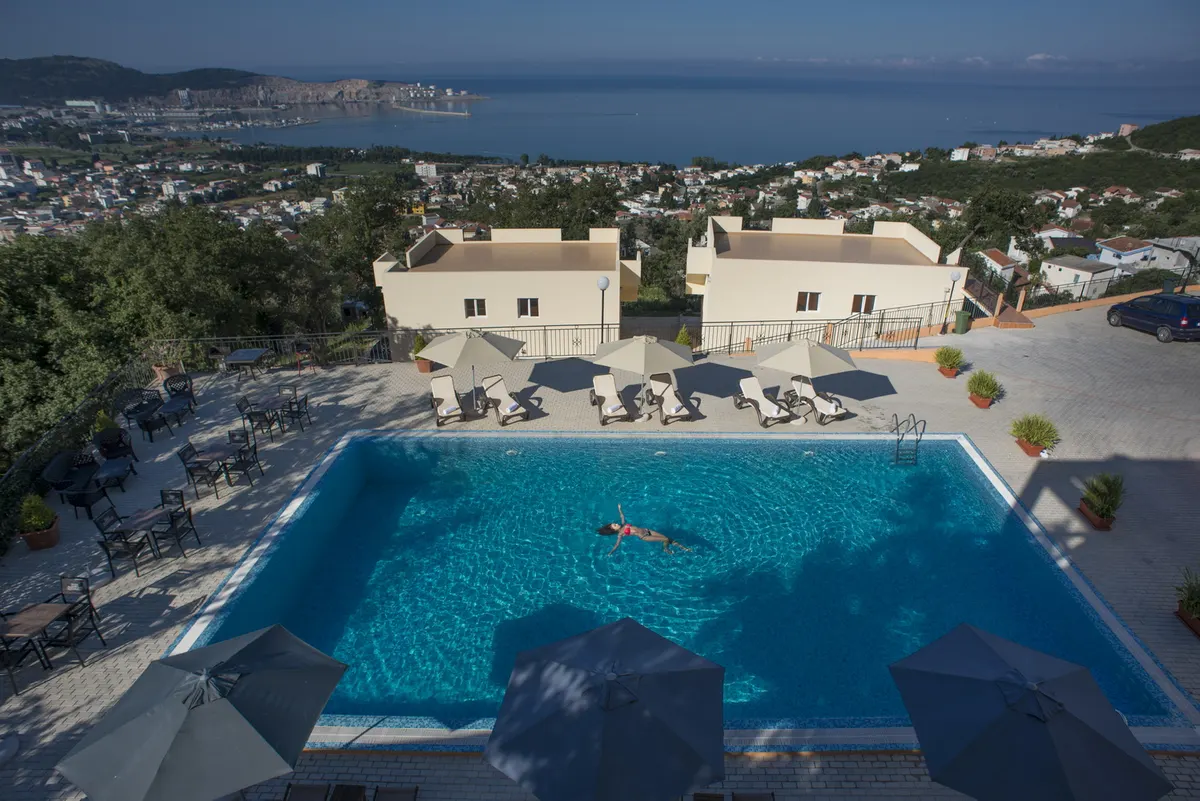 Pool above the Bay of Bar with the town and the sea beyond